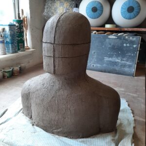 Large bust made of clay.